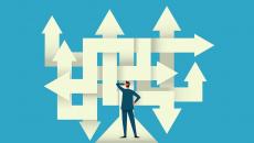 Businessperson on a crossroad