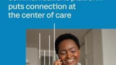 Healthcare worker talking on the phone and looking at pack of pills