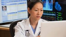 Doctor using computer